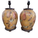 JENNY WORRALL DESIGN, A PAIR OF ATTRACTIVE 20TH CENTURY EXOTIC FRUIT DECORATED LAMP BASES Both