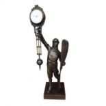 A BRONZE FIGURAL AIRMAN CLOCK With swing pendulum. (h 38cm) Condition: in working order