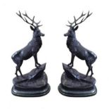 AFTER JULES MOIGNOEZ, A PAIR OF LARGE BRONZE STAG STATUETTES ON MARBLE. (h 74cm) Condition: good