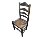A LATE 18TH/EARLY 19TH CENTURY OAK LANCASHIRE LADDER BACK CHAIR Having four shaped back splats and