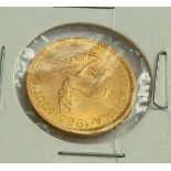 A SOUTH AFRICAN 22CT GOLD TWO RAND COIN, DATED 1963 With Springbok emblem and ‘Unity Is Strength’ to