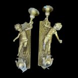 A PAIR OF VINTAGE CHERUB BRASS CANDLE SOLID BRASS WALL SCONCES With mellow patina decorated in Art