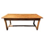 A GOOD EARLY 19TH CENTURY FRENCH FRUIT WOOD REFECTORY FARMHOUSE TABLE, the plank top above a single