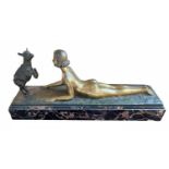 JOSEPH D?ASTE, AN ART DECO BRONZE STATUE OF A NUDE FEMALE WITH LAMB Raised on a marble base,