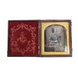 A VICTORIAN DAGUERREOTYPE PORTRAIT OF A YOUNG LADY Silver plated copper plate, housed in a silk