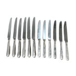 A COLLECTION OF SILVER HANDLED KNIVES, assayed Sheffield 1998. Total gross weight- 714g