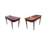 A PAIR OF 19TH CENTURY MAHOGANY D END CONSOLE TABLES raised on turned legs