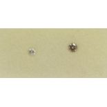 TWO LOOSE UNMOUNTED ROUND BRILLIANT CUT DIAMONDS, boxed. (0.08ct / 0.16ct)