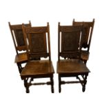 A SET OF FOUR 19TH CENTURY CARVED OAK JACOBEAN DESIGN HALL CHAIRS The floral panel carved backs