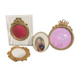 A SET OF FOUR LATE 19TH CENTURY CONTINENTAL GILT METAL HIGHLY ORNATE PHOTOGRAPH FRAME Two oval and