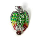 A SILVER EAGLE BROOCH/PENDANT SET WITH RUBY EYE, CABOCHON GARNET AND PLIQUE-A-JOUR.