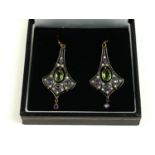 A PAIR FLARED DROP EARRINGS SET WITH OVAL PERIOD, AMETHYST AND DIAMONDS.