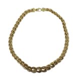 AN ITALIAN 18CT GOLD GRADUATED FANCY LINK NECKLACE. (33.2g, length 42.6cm)
