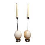 A PAIR OF MID-CENTURY OSTRICH EGG SILVERED CANDLESTICKS (POSSIBLY ITALIAN). (Height 39.1cm x