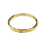 A YELLOW METAL TEXTURED BRACELET, ASSAYED AS 9CT GOLD. (8.4g) Condition: AF