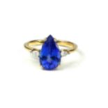 A 14CT GOLD, PEAR CUT TANZANITE AND DIAMOND RING. (approx weight 3.45ct, gross weight 3g, size N½)