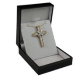 A LARGE 18CT GOLD, BAGUETTE AND ROUND BRILLIANT CUT DIAMOND CROSS Boxed. (diamonds 2.80ct, rd 1.