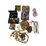 A COLLECTION OF COSTUME JEWELLERY To include various necklaces, bracelets, earrings etc.