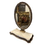 A LATE 19TH/EARLY 20TH CENTURY VENETIAN STYLE DRESSING TABLE MIRROR Having oval mercury glass housed