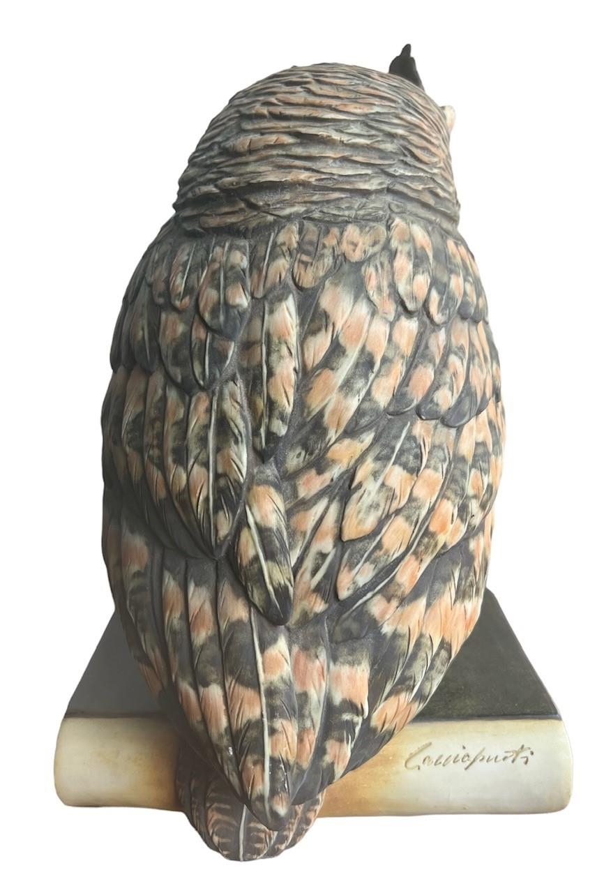 GUIDO CACCIAPUOTI, ITALIAN, 1892 - 1953, A LARGE PORCELAIN OWL PERCHED ON A BOOK Signed on spine. (h - Image 11 of 17