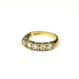 A 9CT GOLD AND FIVE STONE DIAMOND RING. (2.6g, size N)