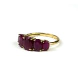 A 9CT GOLD FIVE STONE BURMESE RUBY RING. (approx weight 1.5ct, gross weight 3.6g, size Q½)