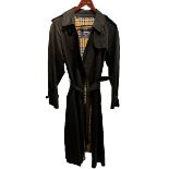 BURBERRY, A LONG BELTED TRENCH COAT. (size M)