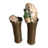 A PAIR OF TAXIDERMY RATS SAT IN A PAIR OF WWII TRENCH ART VASES Made out of 2 Pounder MK 1 shells,