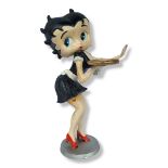 A LARGE CAST IRON BETTY BOOP FIGURE ON BASE Depicting the iconic image as a waitress. (h 30cm)