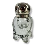 A LARGE EARLY 20TH CENTURY GERMAN SILVER AND GLASS DOME INKWELL The hinged lid with glass set eyes