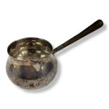 A GEORGIAN SILVER BRANDY WARMING PAN,having a turned wooden handle and engraved swags to body,