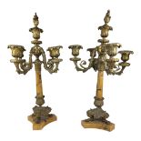 A PAIR OF 19TH CENTURY FRENCH EMPIRE STYLE MARBLE AND GILT METAL TABLE CANDELABRA Each with scroll