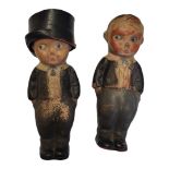 A PAIR OF EARLY 20TH CENTURY RUBBER 'KEWPIE' DOLLS Modelled as young gents in traditional attire,