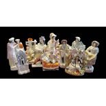 A COLLECTION OF TEN 19TH CENTURY STAFFORDSHIRE POTTERY FLATBACK FIGURES To include a spill vase 'Dog