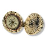 A BONE FOLDING POCKET GLOBE/COMPASS. (diameter 7cm) Condition: good