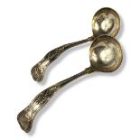 A PAIR OF EARLY 20TH CENTURY SILVER SAUCE LADLES Queens pattern, hallmarked William Yates,