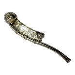 A VICTORIAN SILVER BOSUN'S WHISTLE Having engraved decoration and embossed Royal Navy anchor,