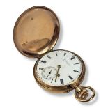 AN EARLY 20TH CENTURY 9CT GOLD LADIES’ FULL HUNTER POCKET WATCH Having engine turned decoration to