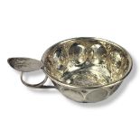 A VICTORIAN SCOTTISH SILVER SPHERICAL WINE TASTER With single handle and thumb rest, set with