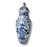 A 19TH/20TH CENTURY CHINESE BLUE AND WHITE VASE AND COVER Decorated with two boys, bearing a
