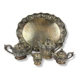 A MID 20TH CENTURY INDONESIAN SILVER TEA SET Heavy gauge comprising teapot, coffee pot, milk jug and