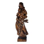 A MODERN 20TH CENTURY ROMANIAN OAK CARVED MADONNA AND CHILD AFTER RENAISSANCE Madonna wearing a long