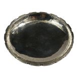 OMAR RAMSDEN, 1873 - 1939, A SMALL CELTIC ART INFLUENCED HAND HAMMERED STERLING SILVER PEDESTAL DISH