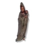 THE CHILD-GIVING GUANYIN (SUNG-TZU GUANYIN) BRONZE SCULPTURE Buddhist deity holding an infant boy on