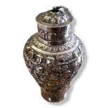 A LATE 19TH/EARLY 20TH CENTURY BURMESE SILVER PROVINCIAL TEA CANISTER The body chased and embossed