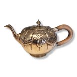 A VICTORIAN CLASSICAL FORM SILVER BATCHELOR’S BULLET TEAPOT With carved wooden handle and embossed