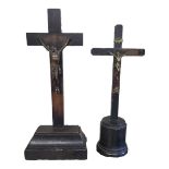 A 19TH CENTURY CONTINENTAL BRONZE AND EBONISED WOOD CRUCIFIX Traditional design with chamfered base,