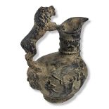 AFTER GRECIAN-ROMAN ANTIQUITIES, A BLACK BASALT TYPE TERRACOTTA LION JUG The body decorated with low