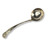 A LARGE EARLY 20TH CENTURY SILVER SOUP LADLE Queens pattern, bearing engraved family crest with