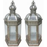 A PAIR OF LARGE STORM LANTERNS Middle Eastern design, single handle on a crown topped dome,